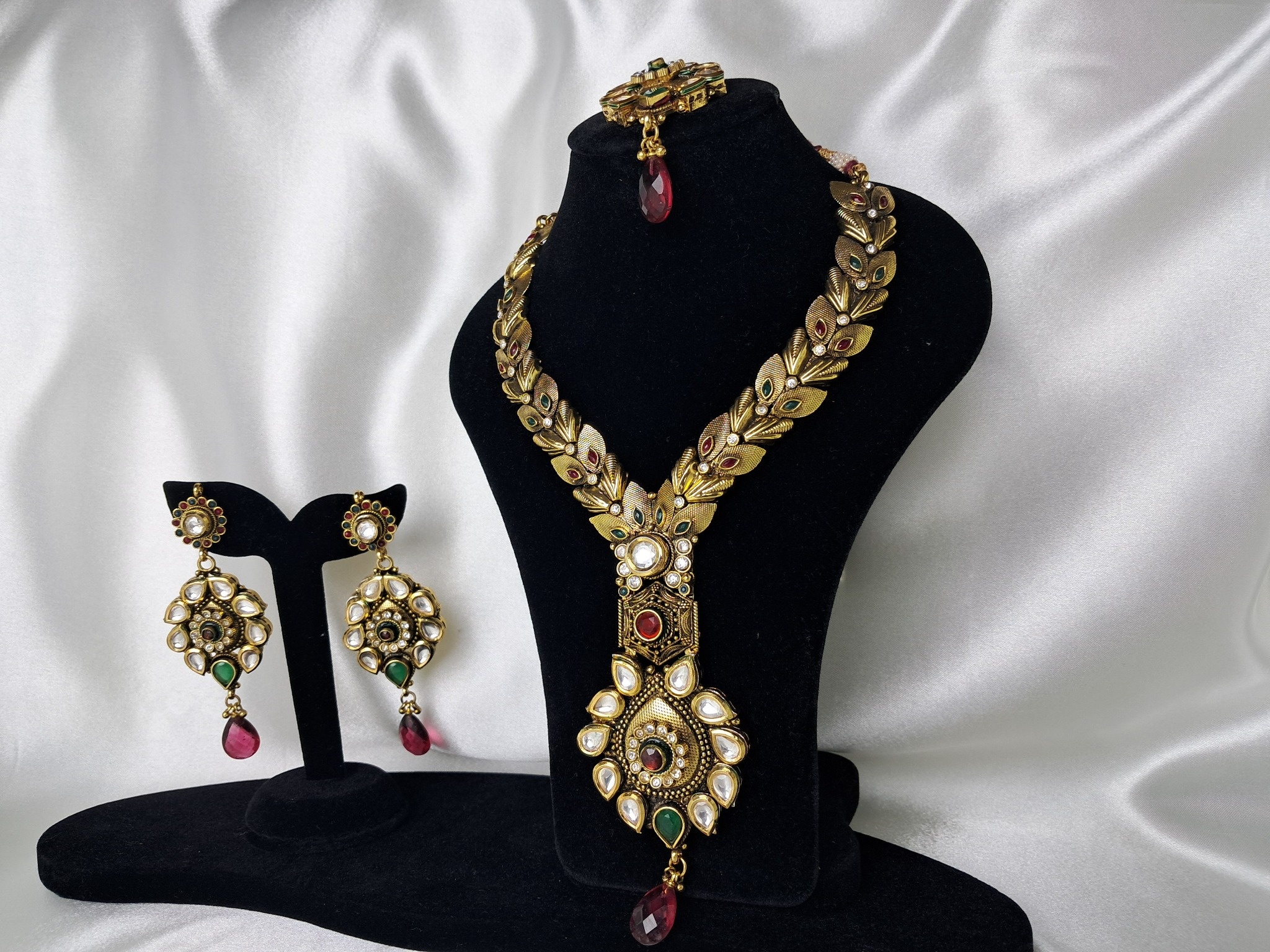 Antique Gold Kundan-Style Necklace Set with Red & Green Stones with matching earrings