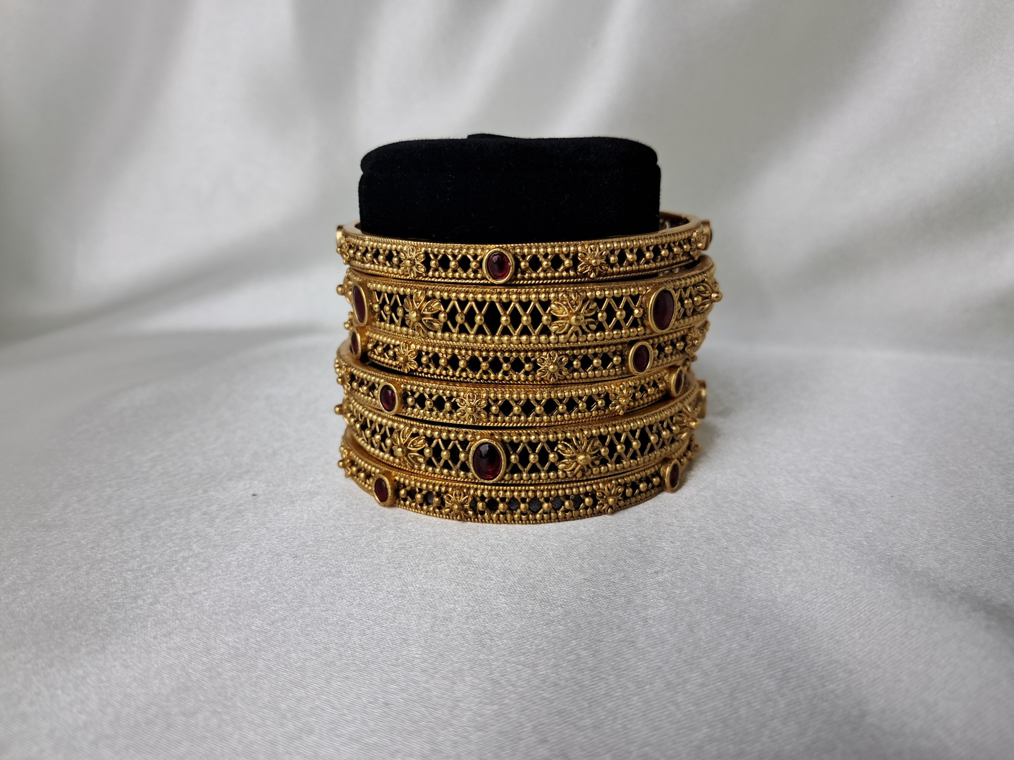 Traditional Antique Gold-Tone Bangles with Red Stone Accents